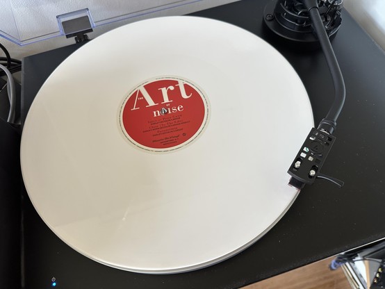 White record on a record deck with art of noise on the label