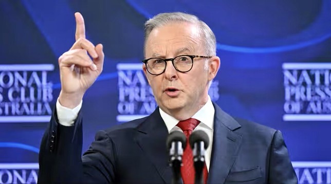 A man with a right hand pointing up, not afraid to talk to National media to all Australians.