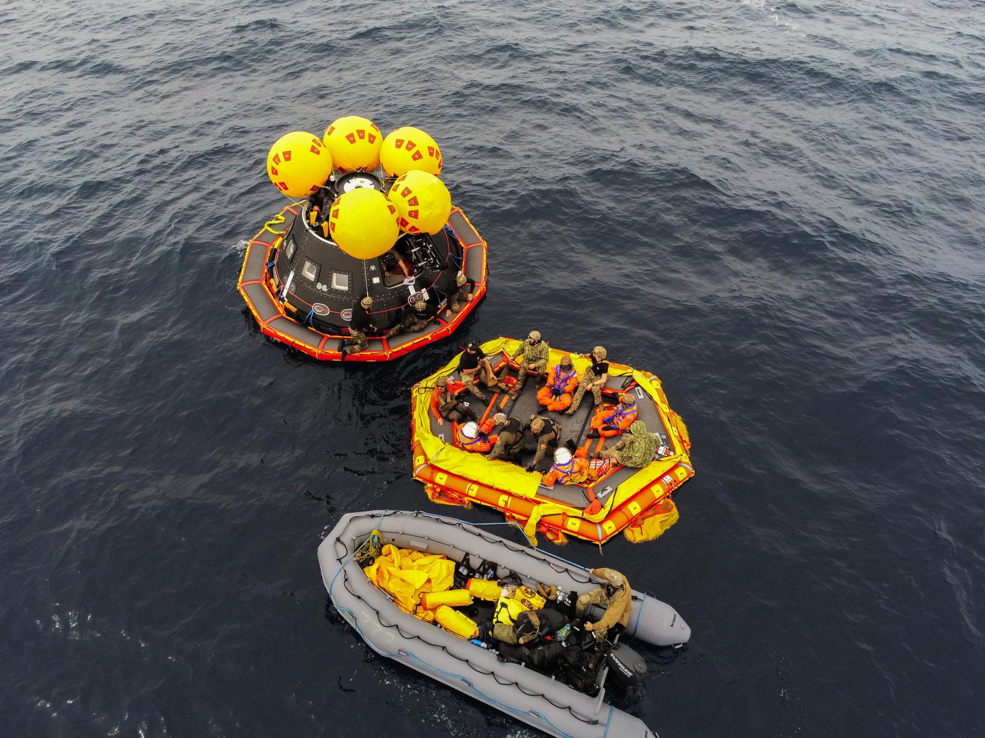 Artemis II crew members and U.S. Navy personnel practice recovery procedures in the Pacific Ocean using a test version of NASA’s Orion spacecraft in February 2024.