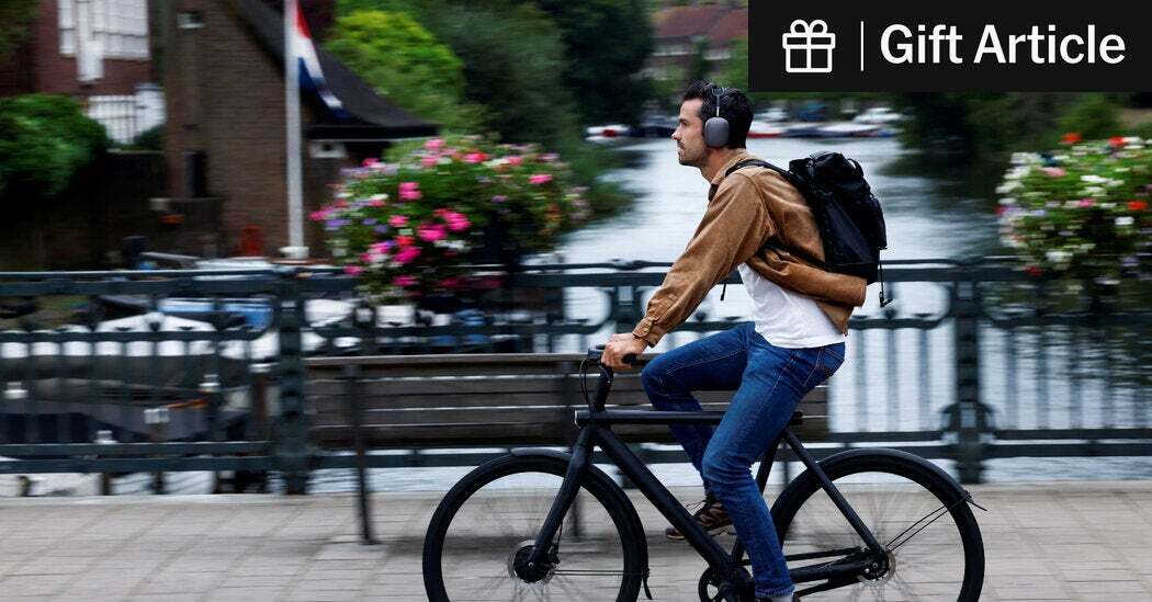 Riding an electric bike without a helmet in Amsterdam in August. Data show that since 2000, traffic accidents have claimed the lives of an average of 199 cyclists in the Netherlands each year. 