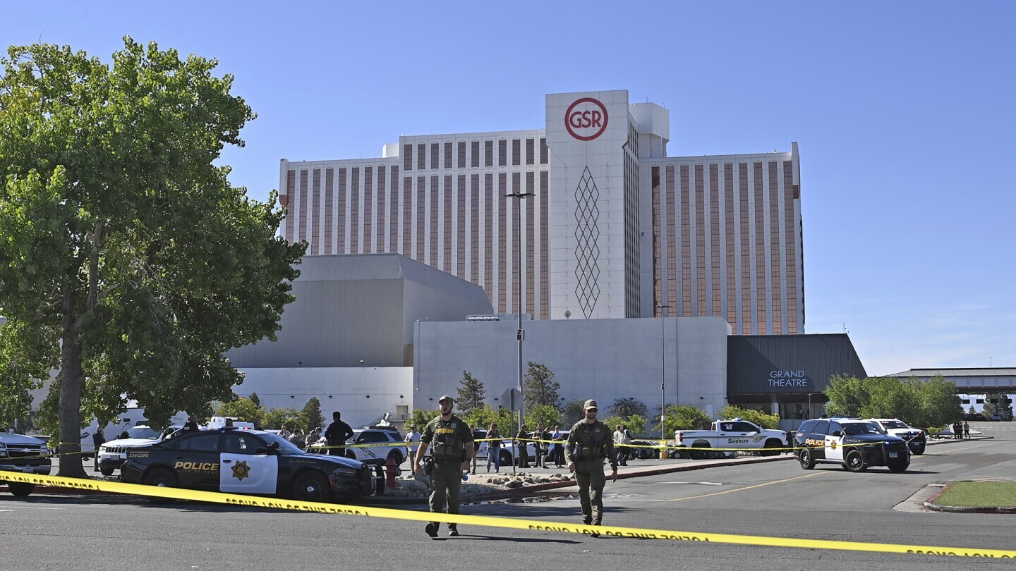 Police respond to a shooting outside the Grand Sierra Resort in Reno, Nev., Monday, July 28, 2025. (AP Photo/Andy Barron)